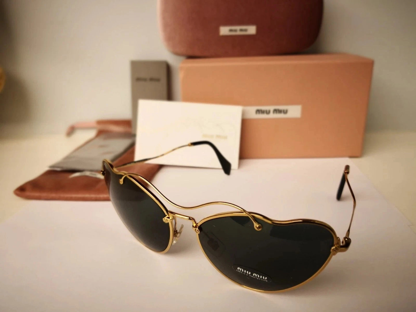 Miu Miu 0MU55RS-7OE1A1-65 0
